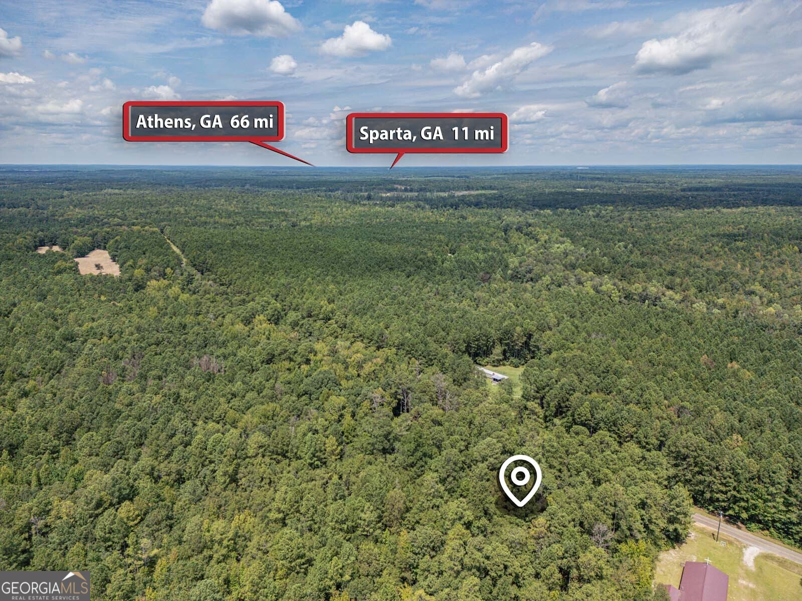 2 Balerma Church Road Sparta, GA 31087 - Photo 11 of 16 a view of a sign board with lots of trees