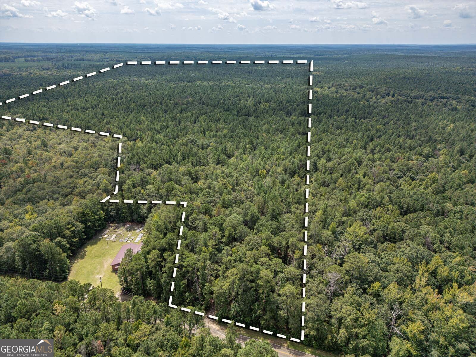 2 Balerma Church Road Sparta, GA 31087 - Photo 7 of 16 a view of a lake with a mountain in the background