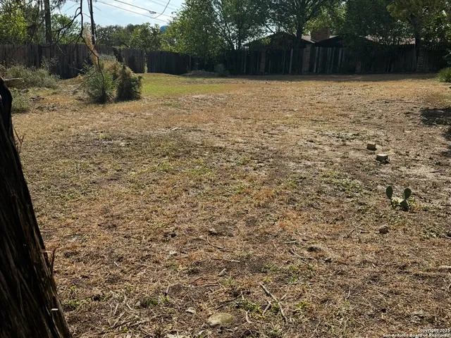 a view of outdoor space and yard
