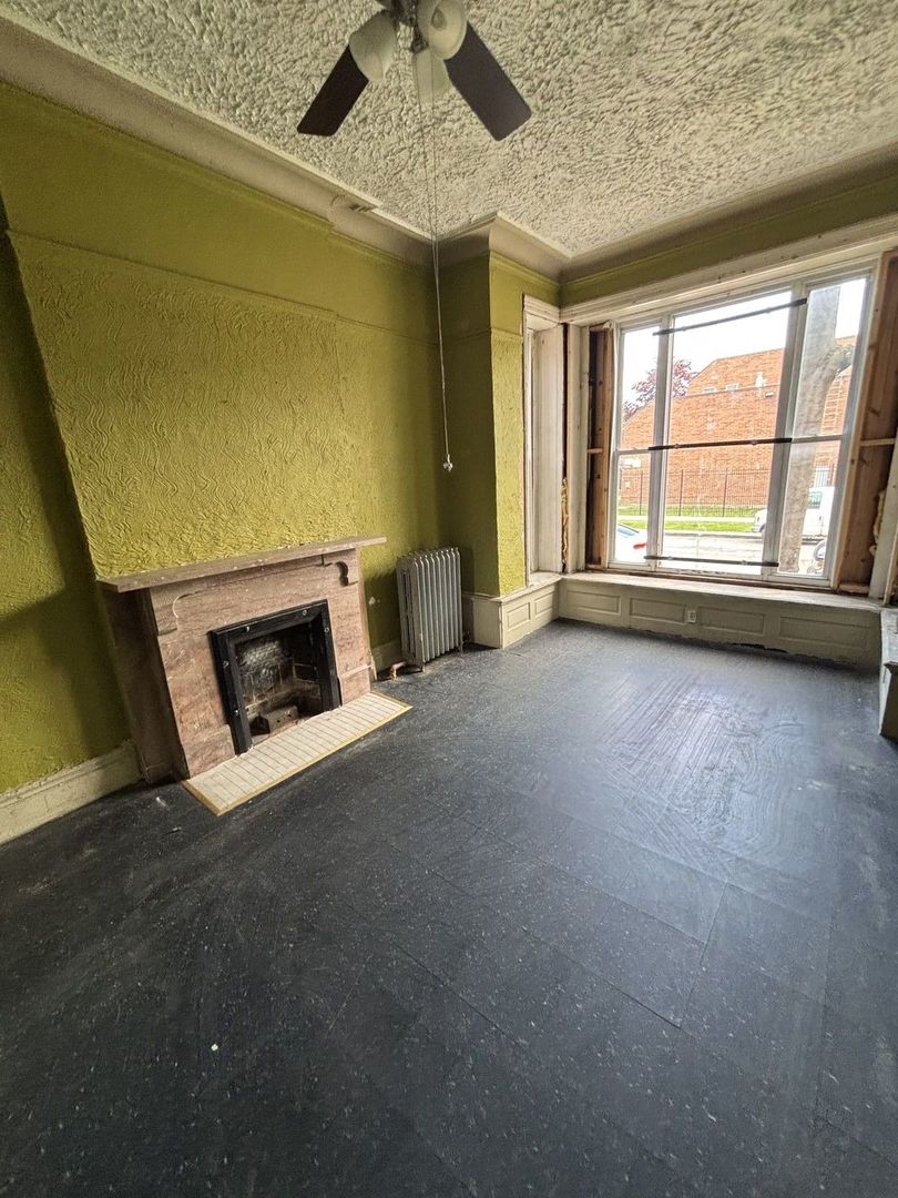 3316 West Maypole Avenue Chicago, IL 60624 - Photo 19 of 40 a view of a livingroom with a fireplace