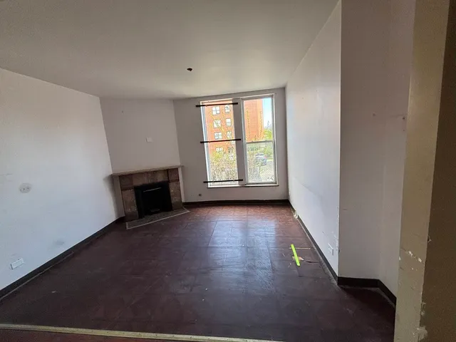 a kitchen with a refrigerator and a sink