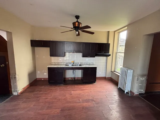 a view of a room that has a window