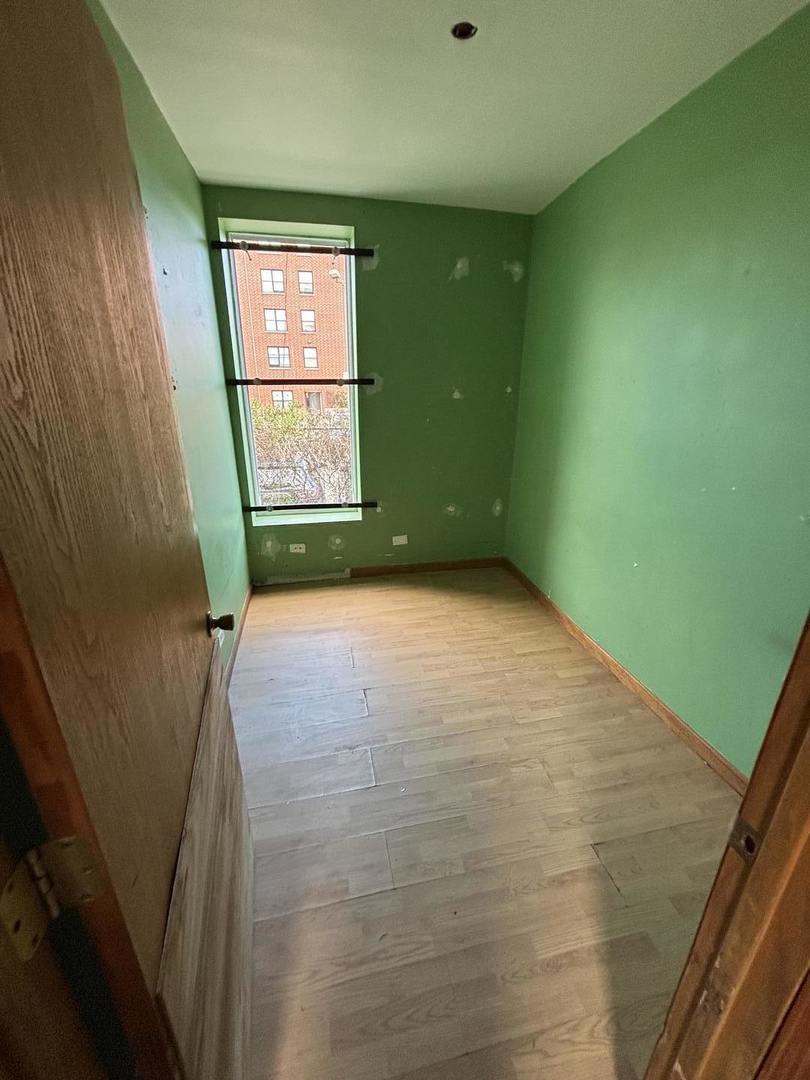 3316 West Maypole Avenue Chicago, IL 60624 - Photo 23 of 40 a view of a room that has a window