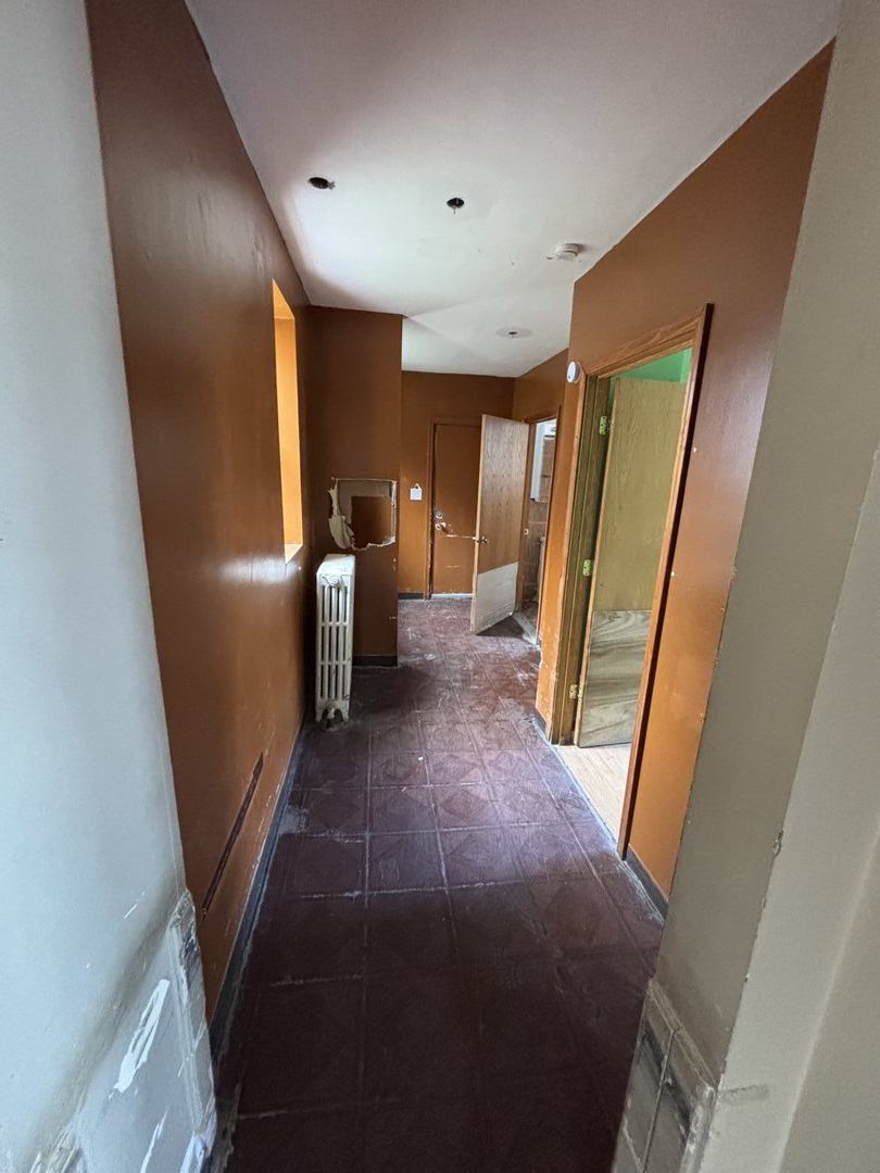 3316 West Maypole Avenue Chicago, IL 60624 - Photo 5 of 40 a view of a livingroom with furniture and a window