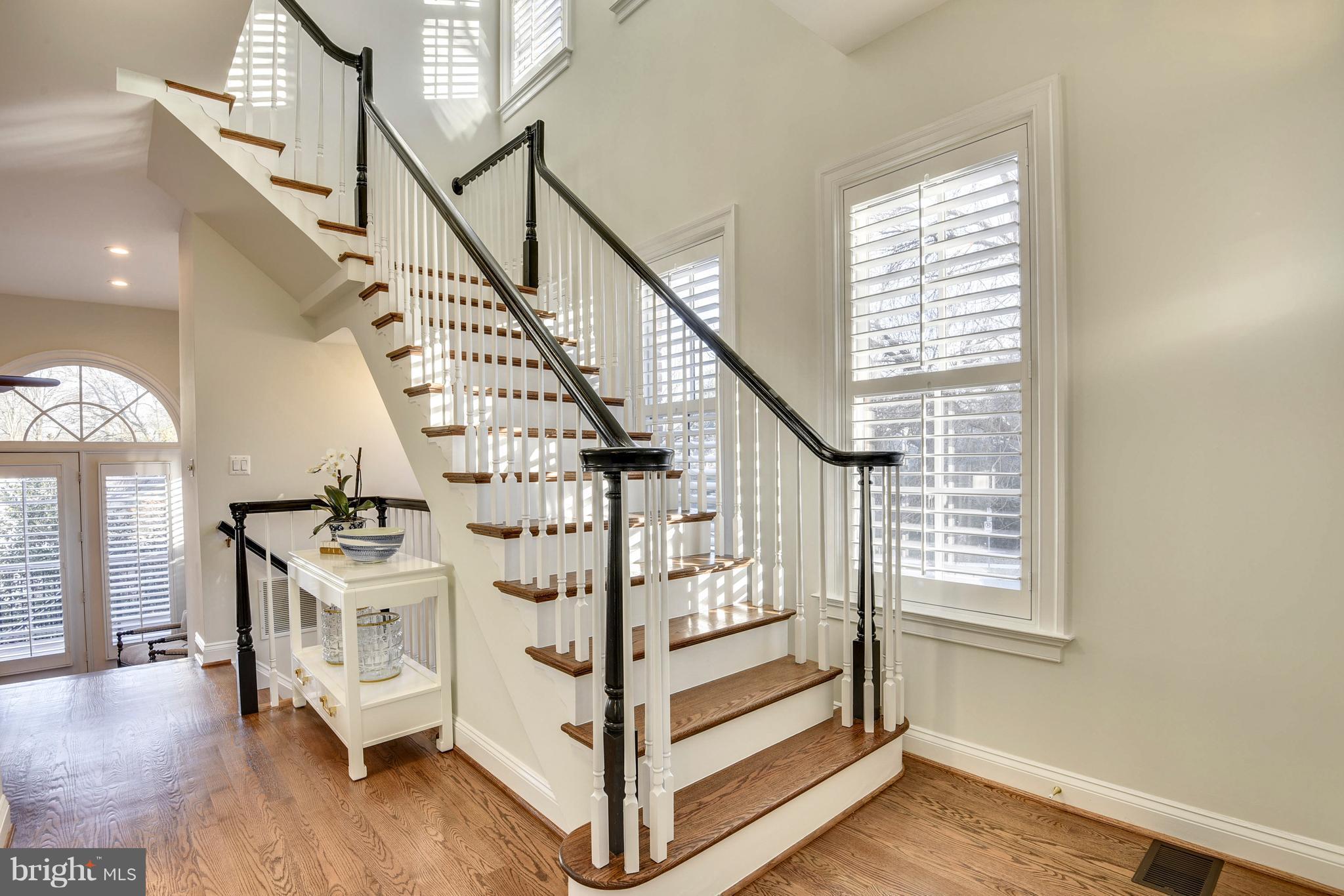 8501 Halston Way Bethesda, MD 20814 - Photo 11 of 29 Refinished Hardwood floors and stairs, Black Rails