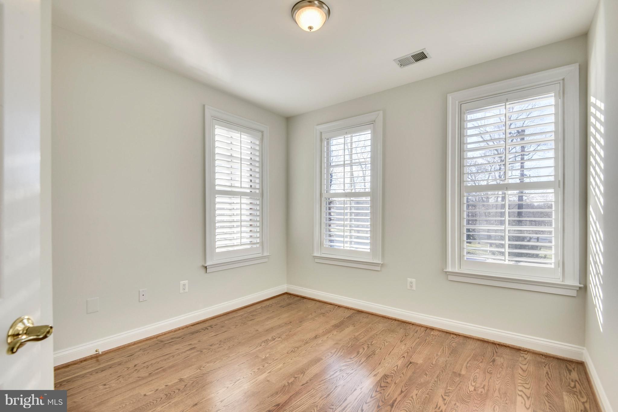 8501 Halston Way Bethesda, MD 20814 - Photo 19 of 29 Bedroom #2 with Plantation Shutters, hardwoods