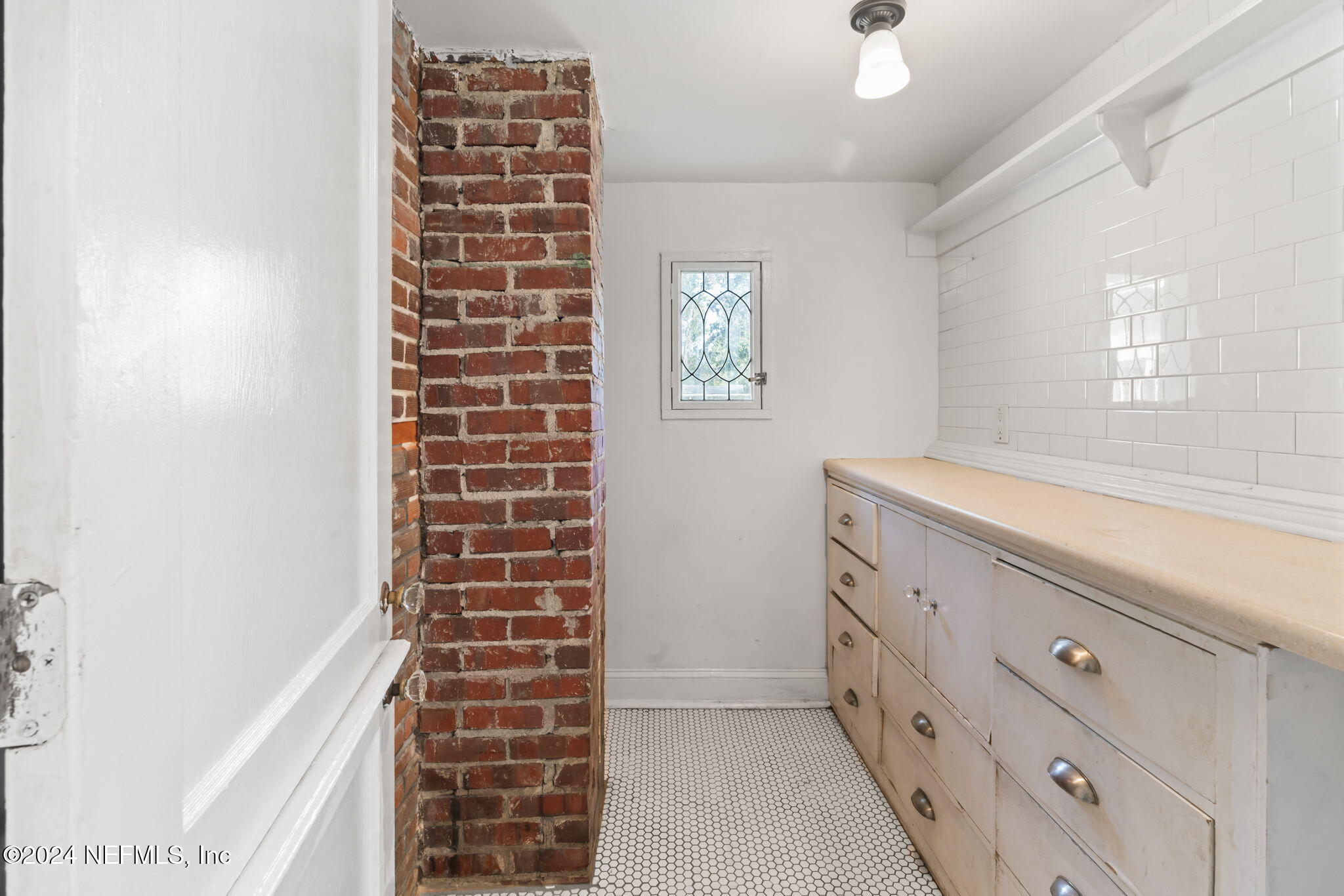 33 River Road Orange Park, FL 32073 - Photo 17 of 81 a bathroom with a sink and a mirror
