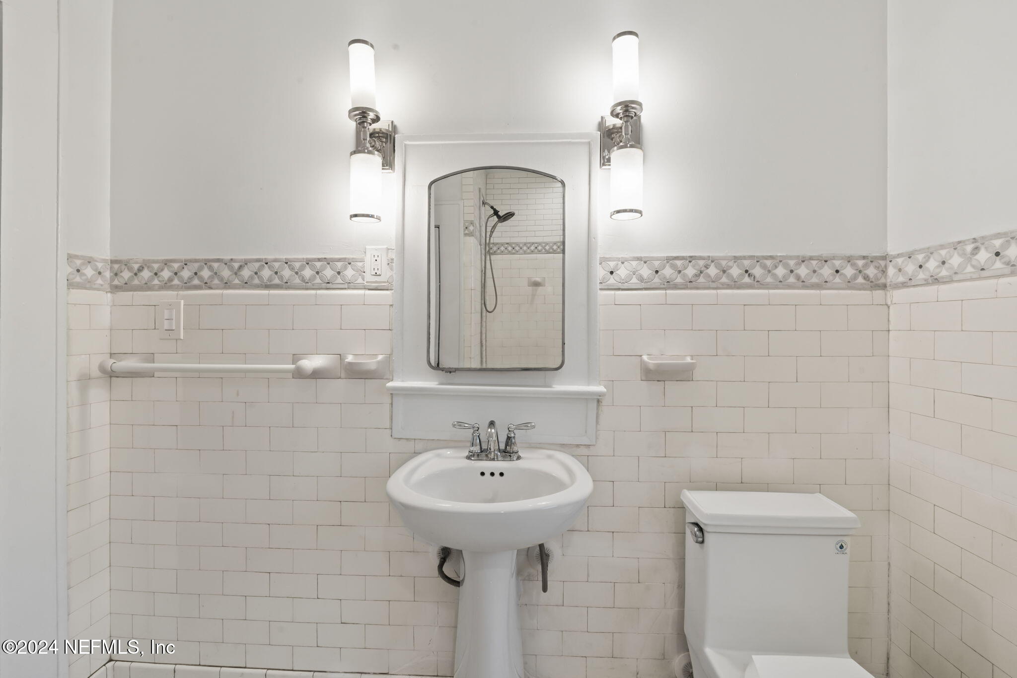 33 River Road Orange Park, FL 32073 - Photo 46 of 81 a bathroom with a sink a toilet and mirror