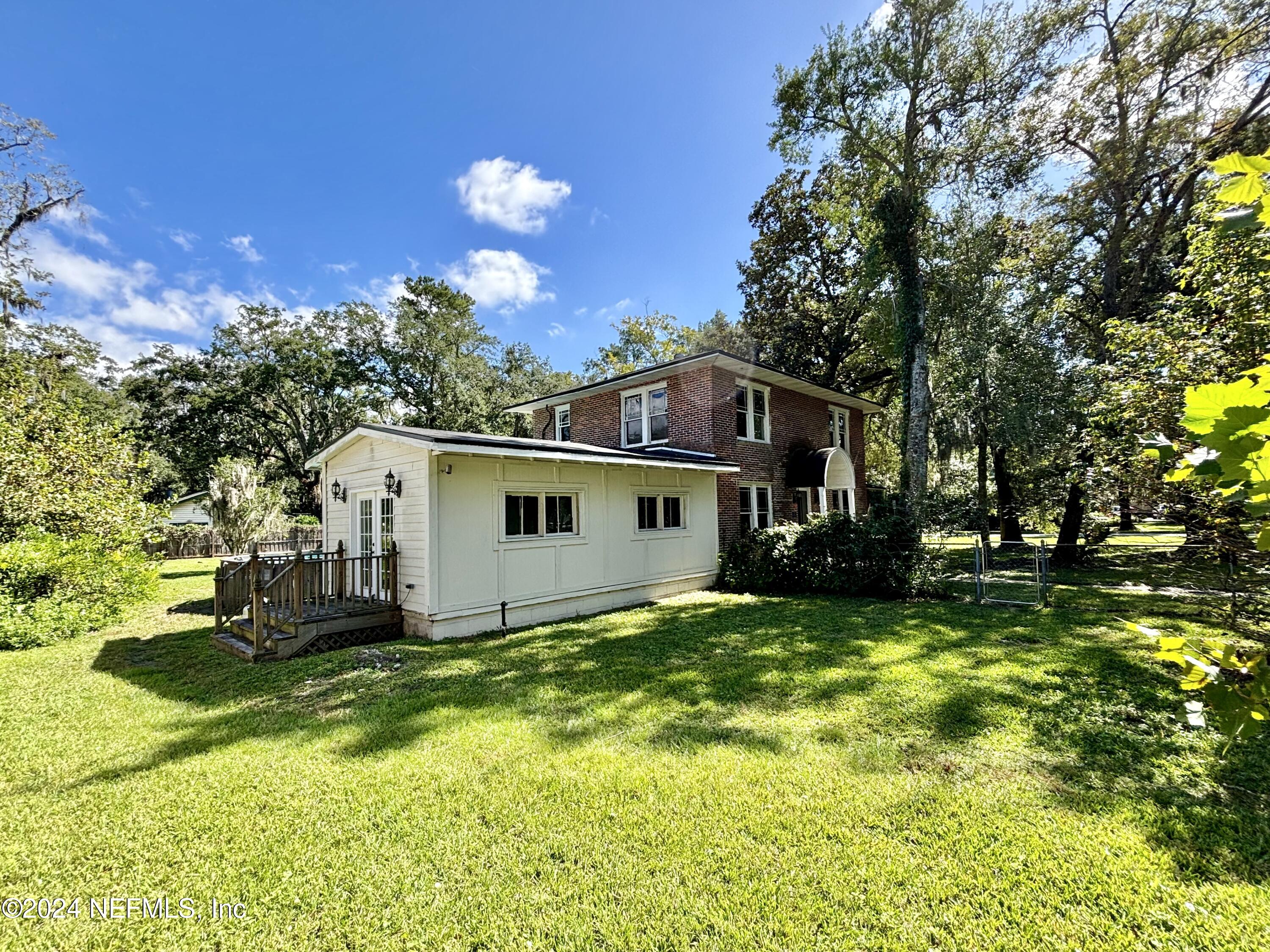 33 River Road Orange Park, FL 32073 - Photo 65 of 81 a view of a house with a big yard