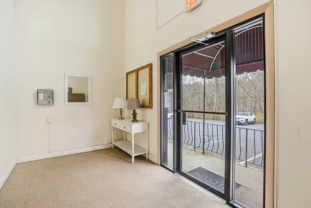 a very nice looking room with a glass door