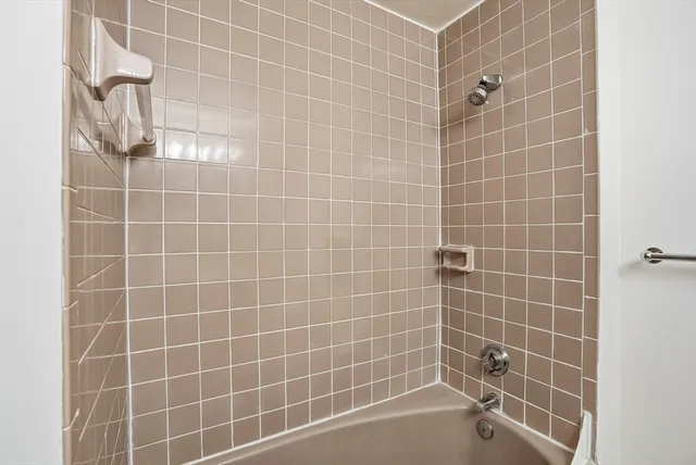 a view of a bathroom with a glass door