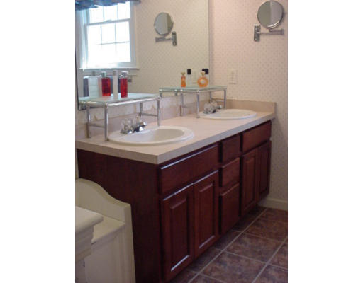 140 O'Malley Road Marlborough, MA 01752 - Photo 17 of 19 a bathroom with a sink and a mirror