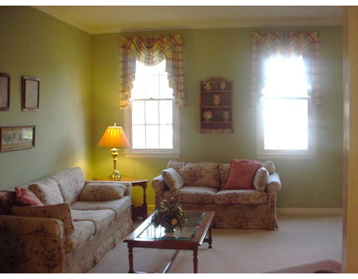 140 O'Malley Road Marlborough, MA 01752 - Photo 7 of 19 a living room with furniture and a window