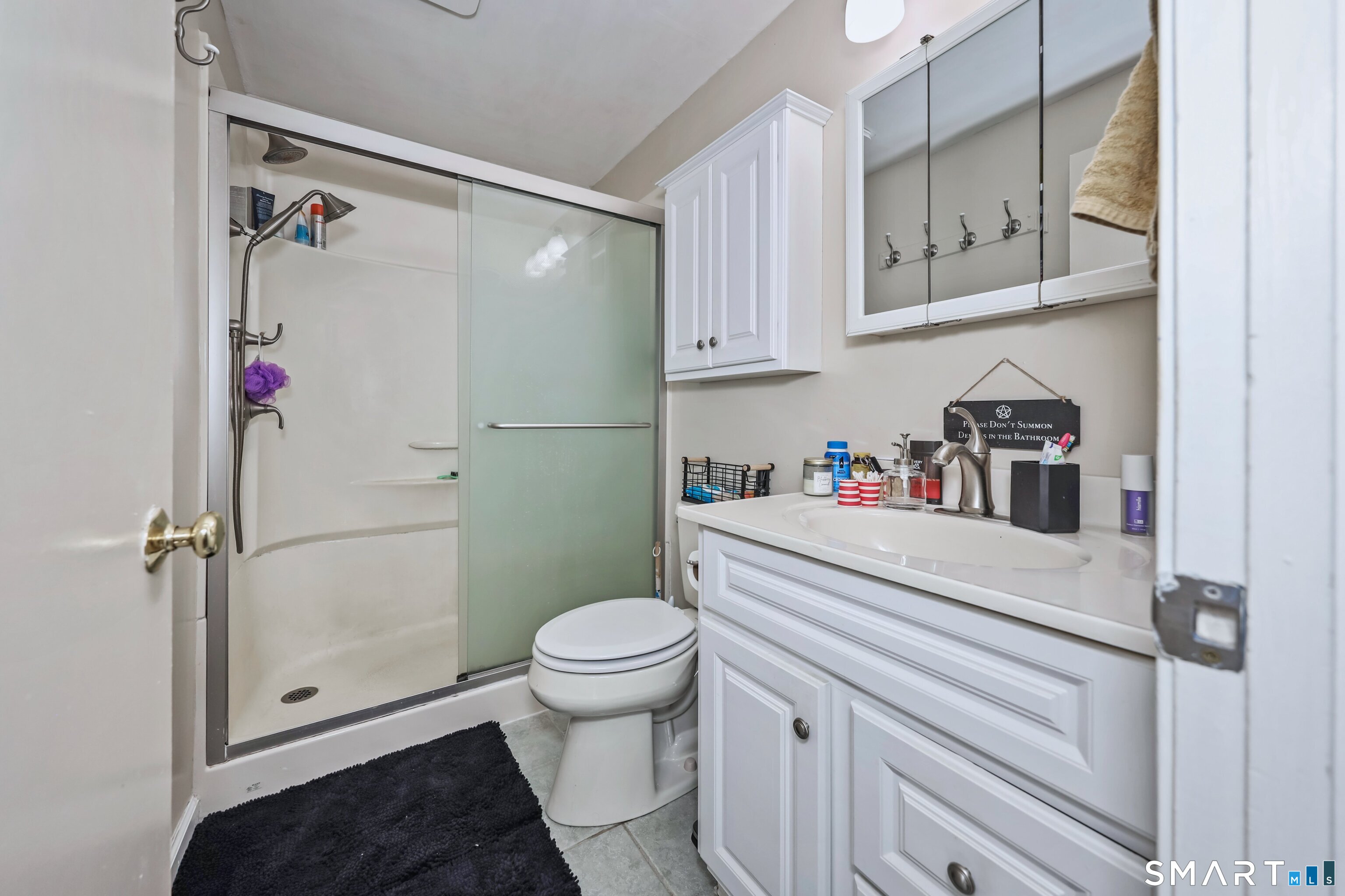 349 Allen Road, Unit 34C Torrington, CT 06790 - Photo 14 of 31 a bathroom with a sink toilet and shower