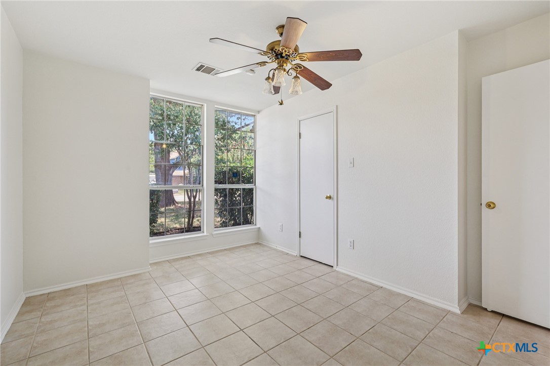 303 North Kings Canyon Drive Cedar Park, TX 78613 - Photo 11 of 24 a view of an empty room with a window
