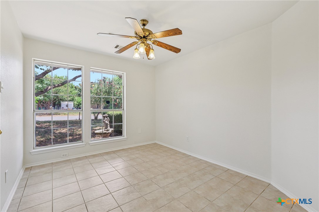 303 North Kings Canyon Drive Cedar Park, TX 78613 - Photo 10 of 24 a view of an empty room with a window