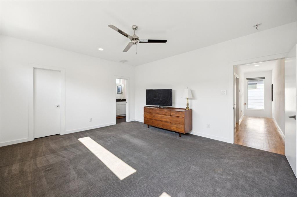 4903 Jack Court Dallas, TX 75206 - Photo 14 of 26 a view of empty room with a flat screen tv