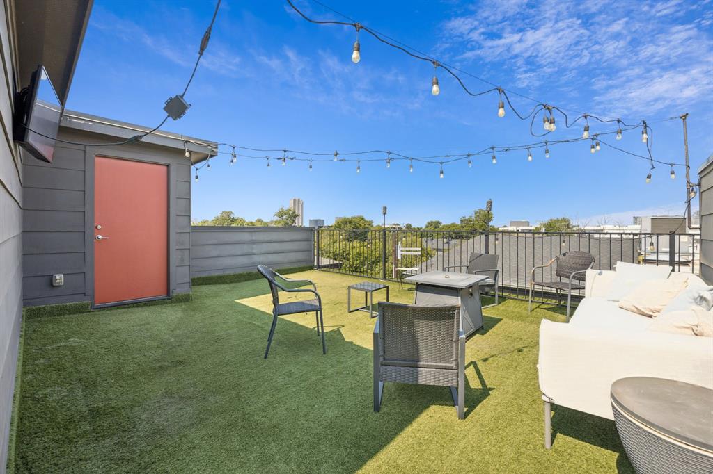 4903 Jack Court Dallas, TX 75206 - Photo 22 of 26 a view of a patio with table and chairs