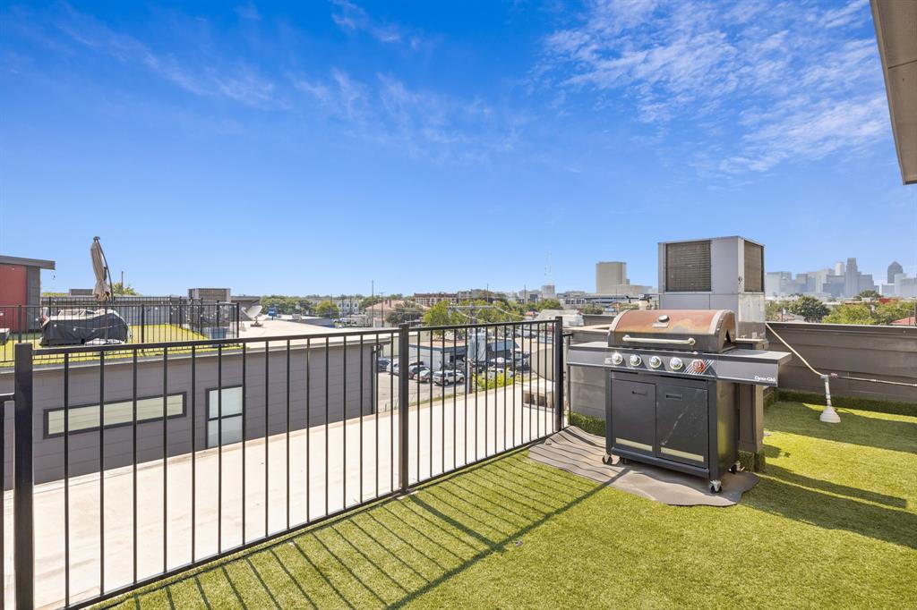 4903 Jack Court Dallas, TX 75206 - Photo 24 of 26 a view of a balcony with flat screen tv