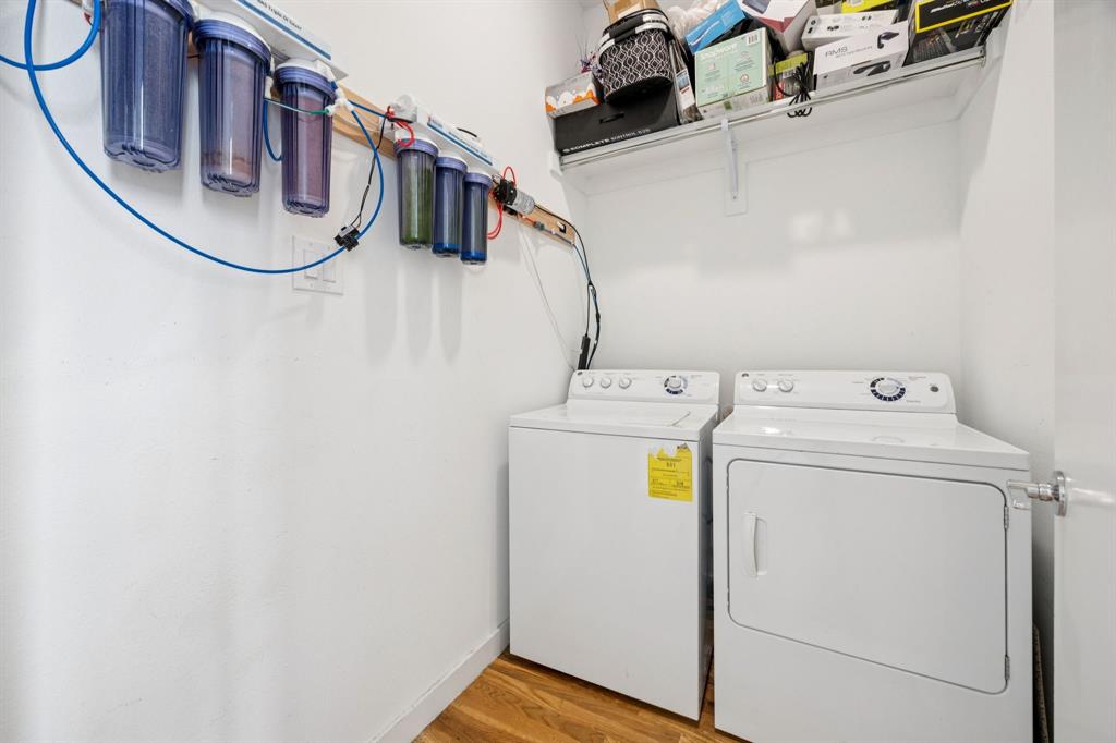 4903 Jack Court Dallas, TX 75206 - Photo 10 of 26 a utility room with dryer and washer