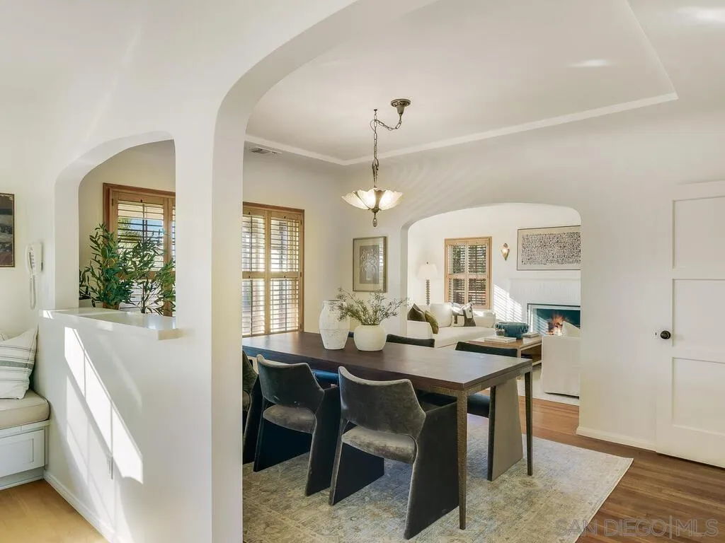 4611 Natalie Drive San Diego, CA 92115 - Photo 13 of 41 a view of a dining room with furniture window and wooden floor