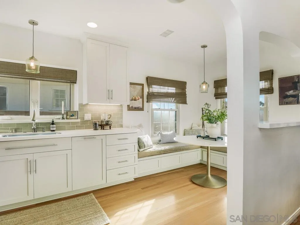 4611 Natalie Drive San Diego, CA 92115 - Photo 15 of 41 a kitchen with sink cabinets and window