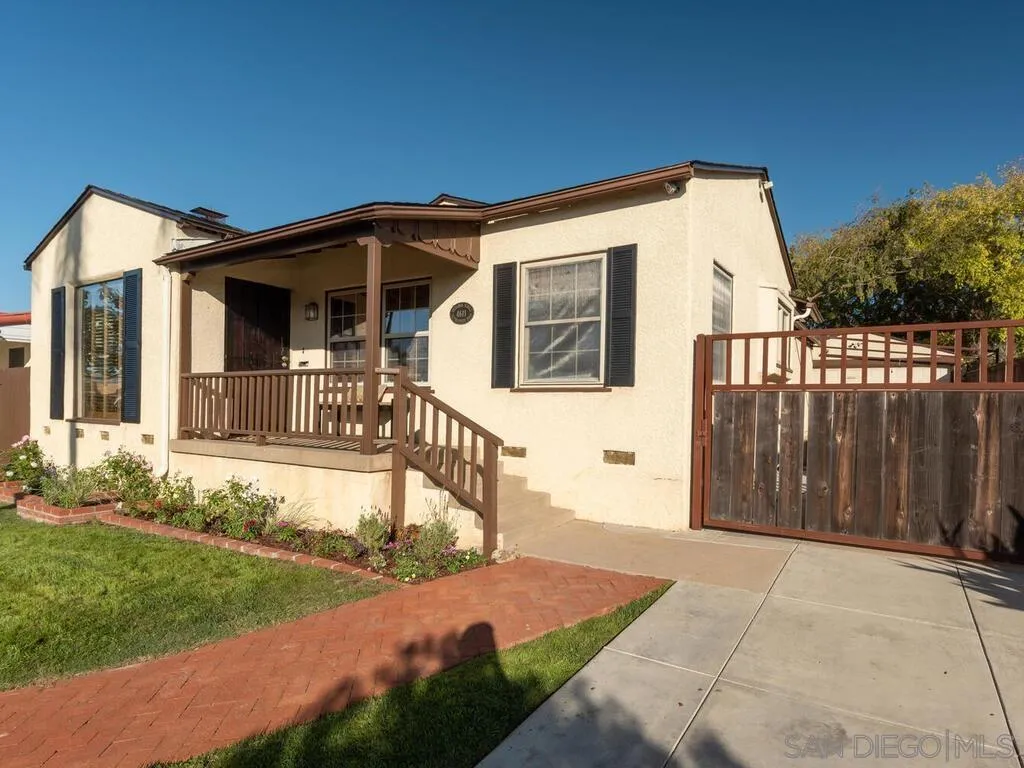 4611 Natalie Drive San Diego, CA 92115 - Photo 2 of 41 a front view of a house with a yard