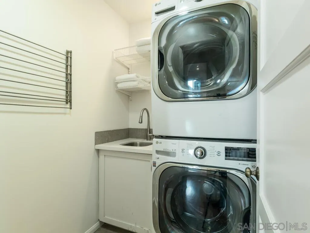 4611 Natalie Drive San Diego, CA 92115 - Photo 33 of 41 a utility room with dryer and washer