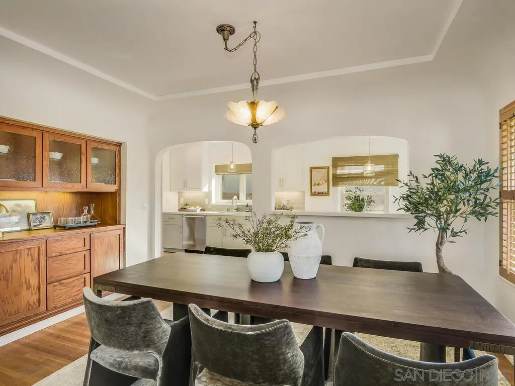 4611 Natalie Drive San Diego, CA 92115 - Photo 9 of 41 a view of a dining room with furniture and a potted plant