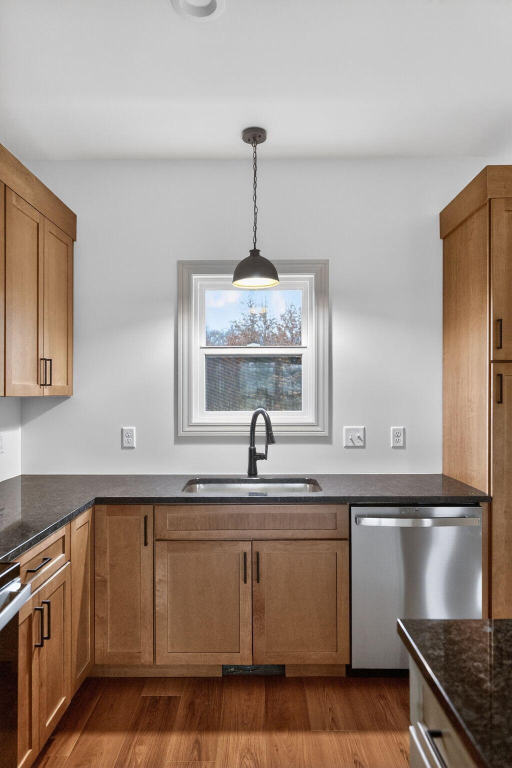 238 East 550 North Rensselaer, IN 47978 - Photo 19 of 33 a kitchen with stainless steel appliances granite countertop a sink a stove and a refrigerator