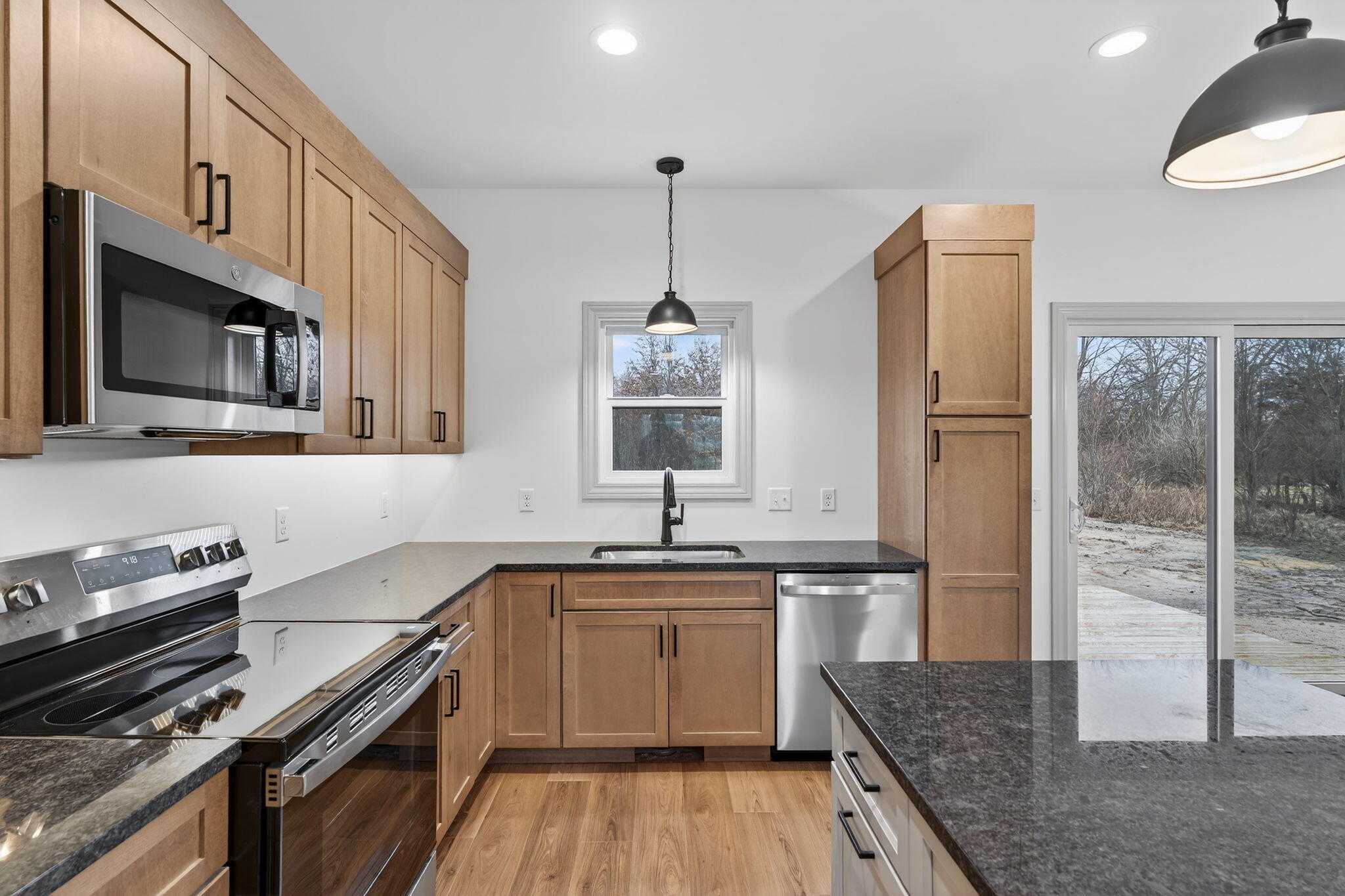 238 East 550 North Rensselaer, IN 47978 - Photo 19 of 35 a kitchen with a sink stove and refrigerator