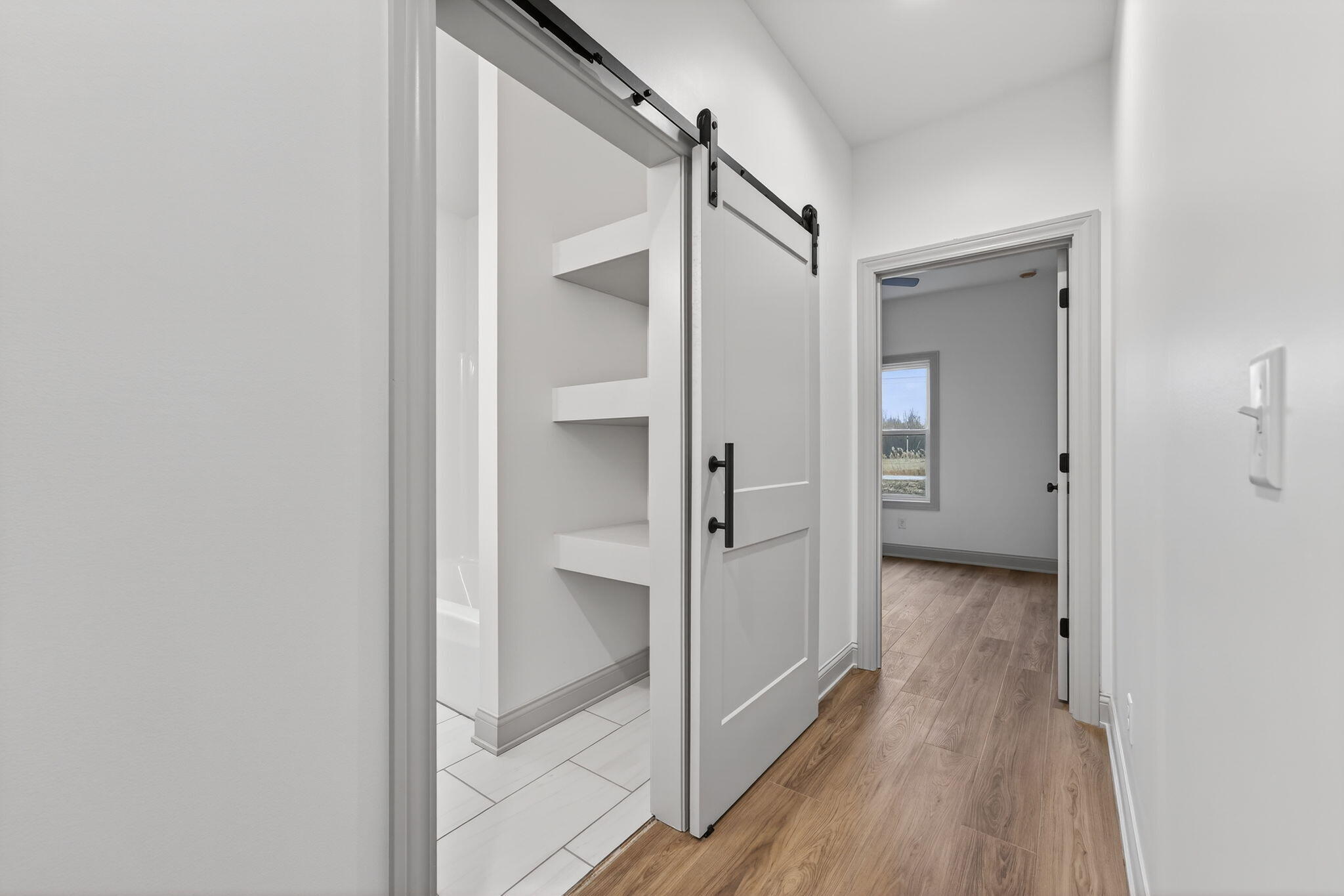 238 East 550 North Rensselaer, IN 47978 - Photo 28 of 33 a view of a hallway with wooden floor