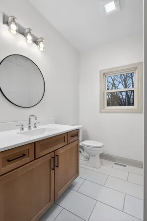 a view of a small space with wooden floor