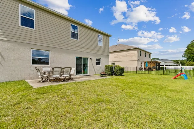a view of a golf course with a lake view