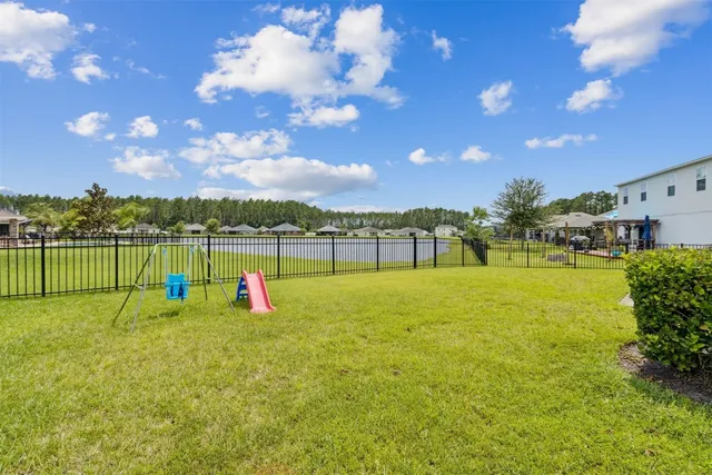 an aerial view of a house with a garden