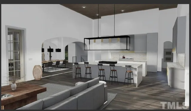 a kitchen with stainless steel appliances a stove a sink cabinets and a dining table