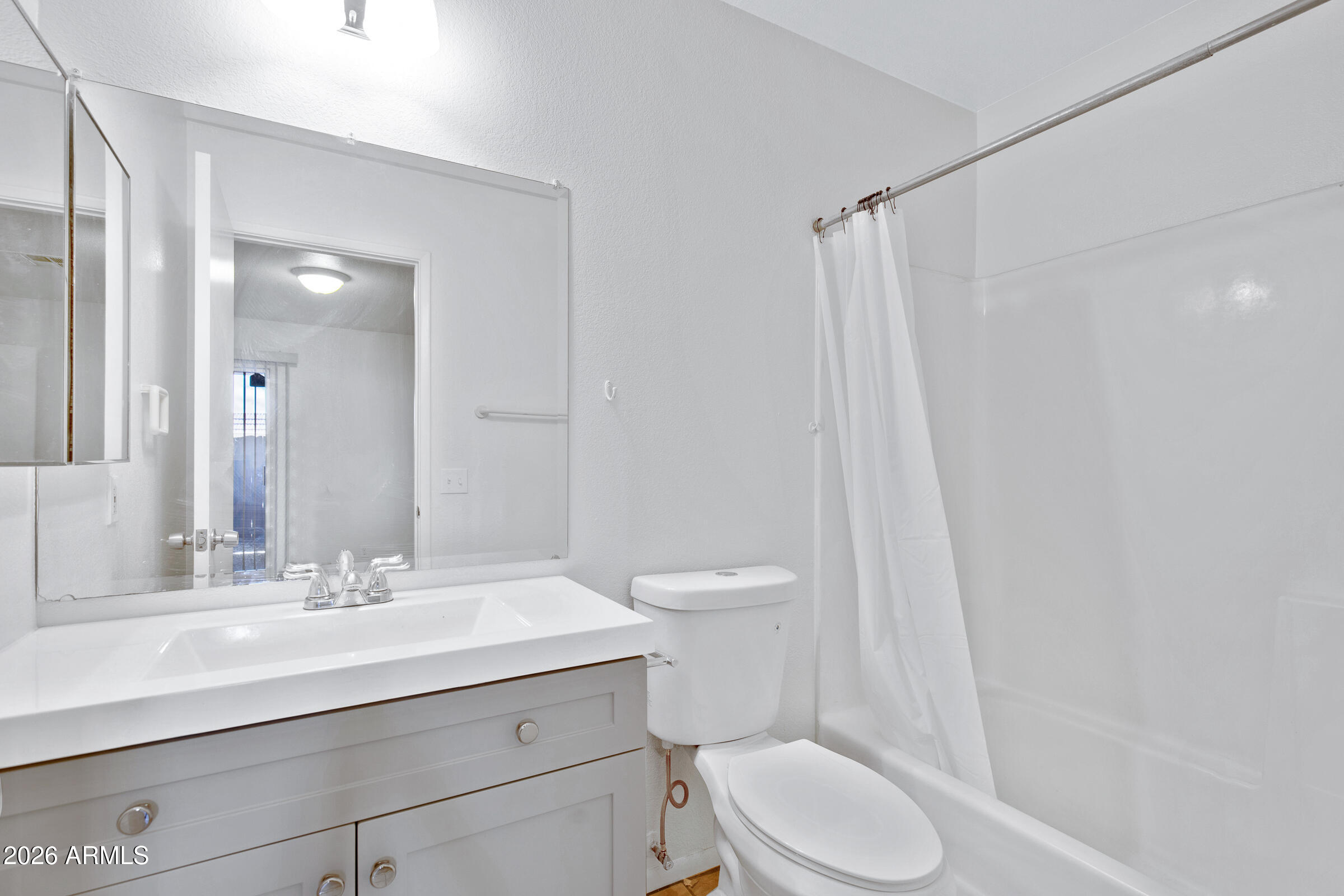 20235 North 3rd Drive, Unit 8 Phoenix, AZ 85027 - Photo 6 of 30 a bathroom with a sink a toilet and shower