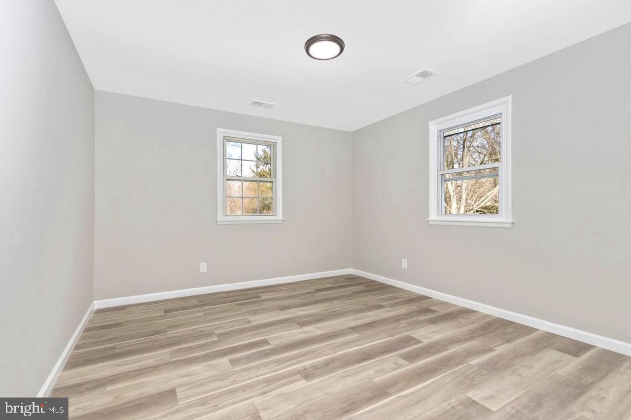 6738 Allview Drive Columbia, MD 21046 - Photo 13 of 33 a view of a room that has a window and a dresser