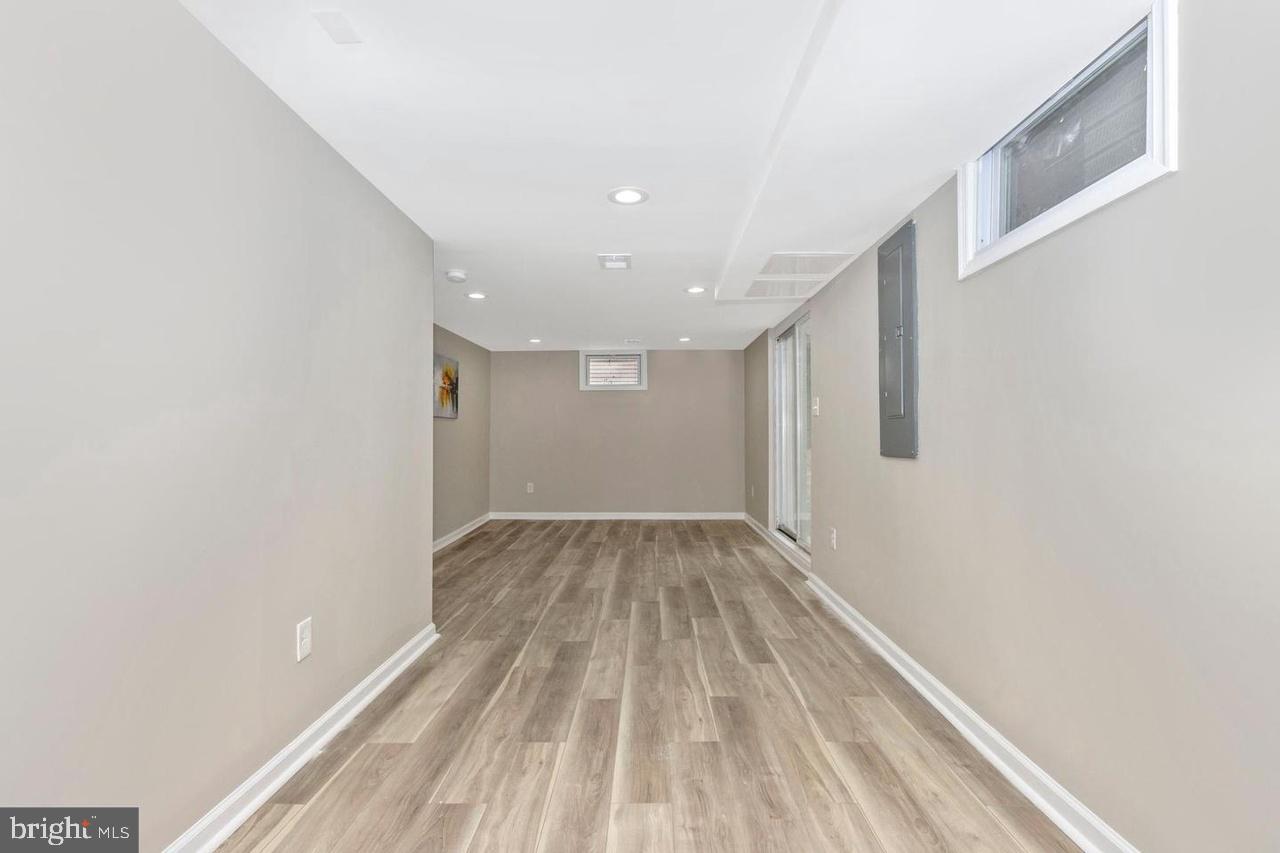 6738 Allview Drive Columbia, MD 21046 - Photo 22 of 33 a view of empty room with wooden floor