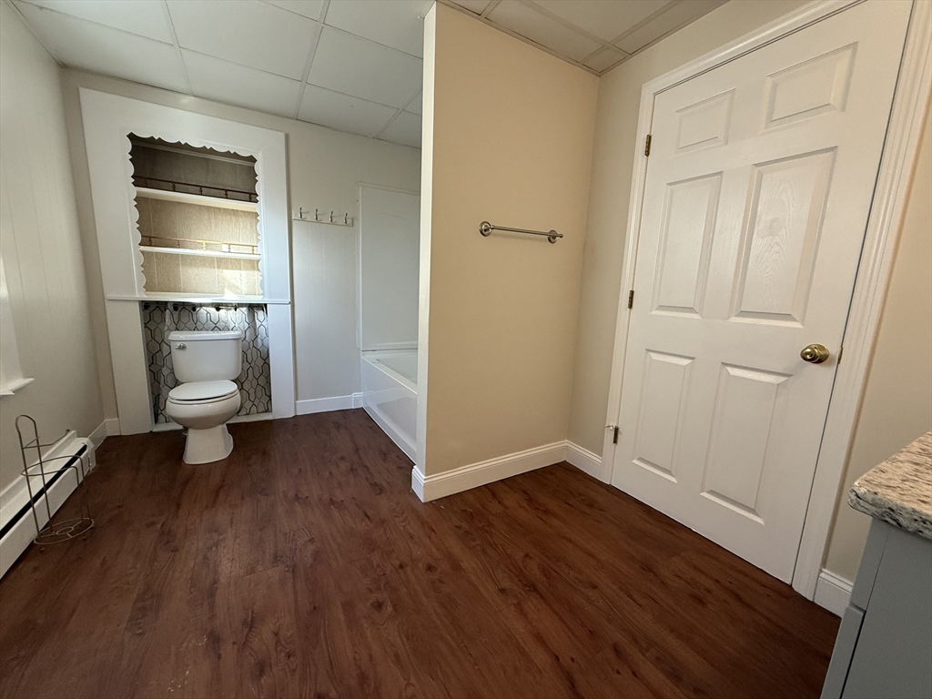 866 Center Street, Unit 2 Middleboro, MA 02346 - Photo 11 of 11 a view of empty room with wooden floor