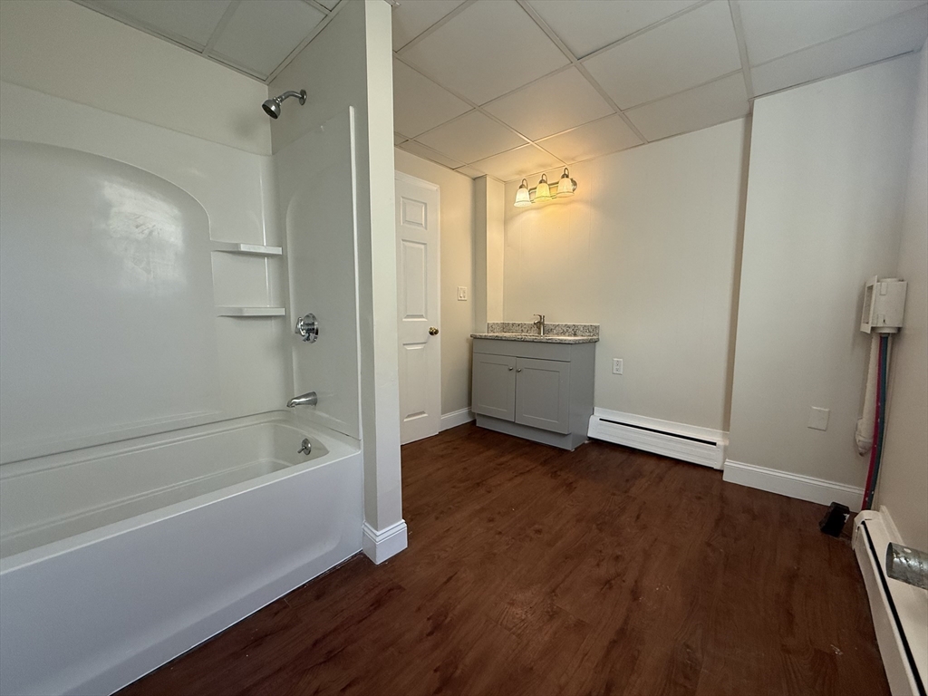 866 Center Street, Unit 2 Middleboro, MA 02346 - Photo 10 of 11 a view of bathroom with shower and bathtub