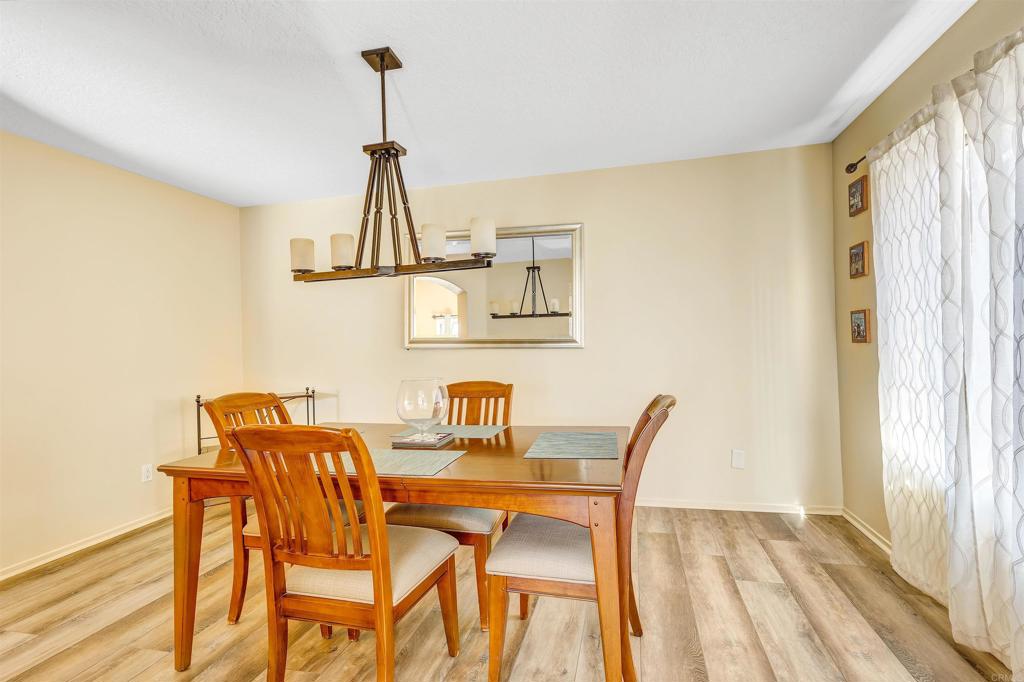 4559 Coronado Drive Oceanside, CA 92057 - Photo 12 of 29 a view of a dining room with furniture and window