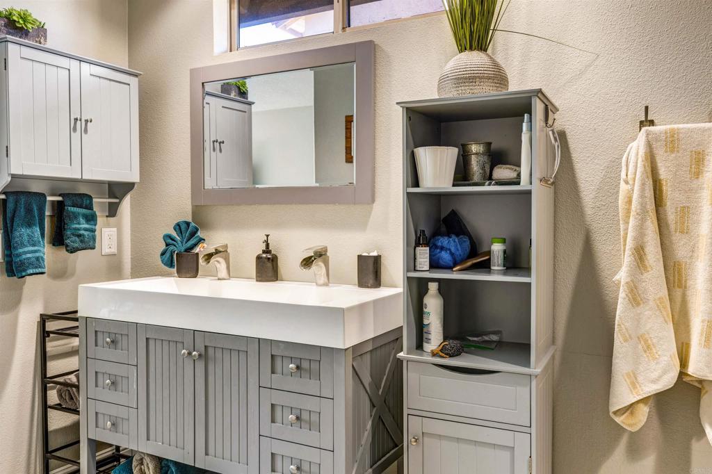 4559 Coronado Drive Oceanside, CA 92057 - Photo 16 of 29 a kitchen with cabinets and a stove