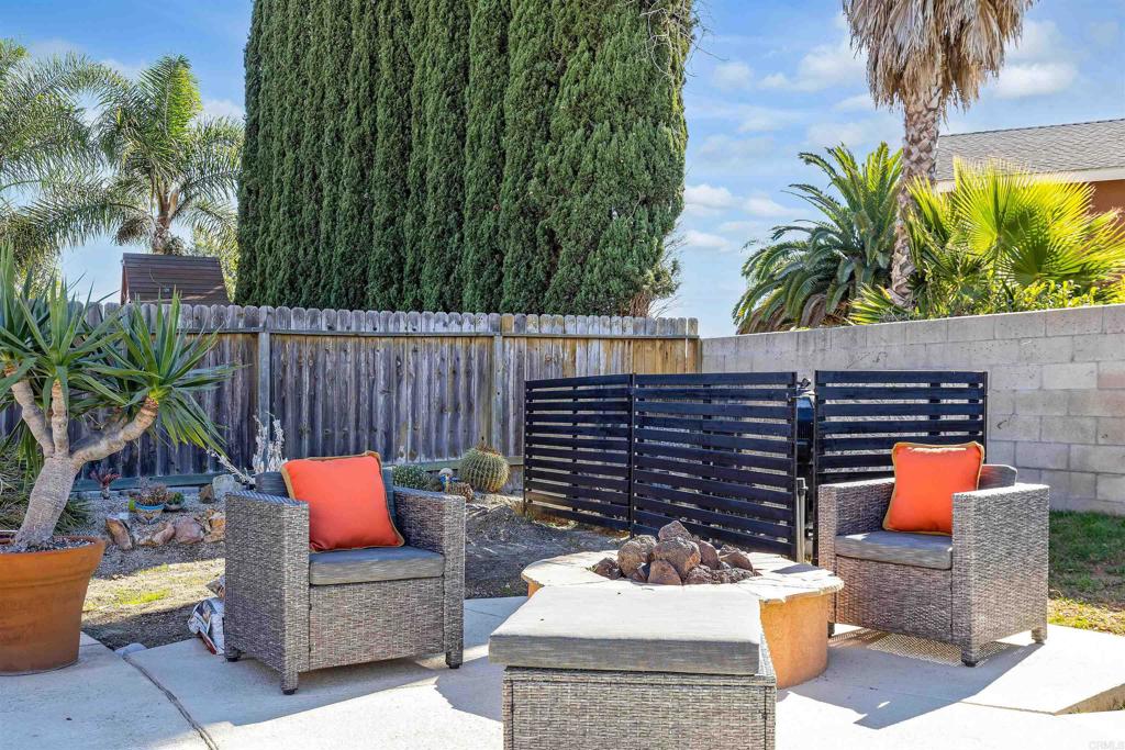 4559 Coronado Drive Oceanside, CA 92057 - Photo 28 of 29 a outdoor space with the couches and a potted plant