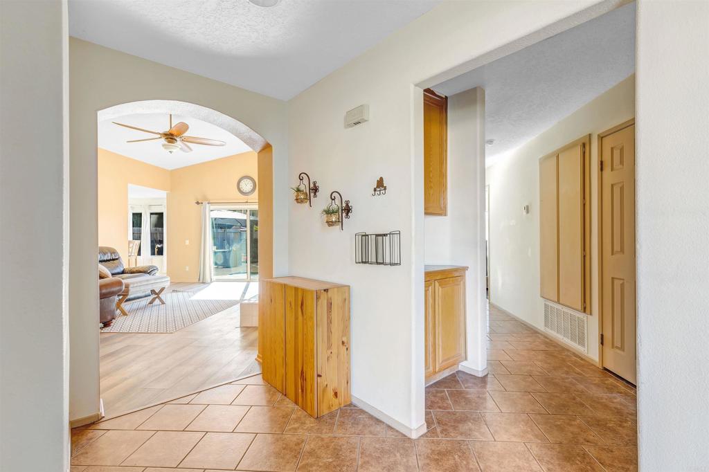 4559 Coronado Drive Oceanside, CA 92057 - Photo 3 of 29 a view of a hallway with dining area and a livingroom view