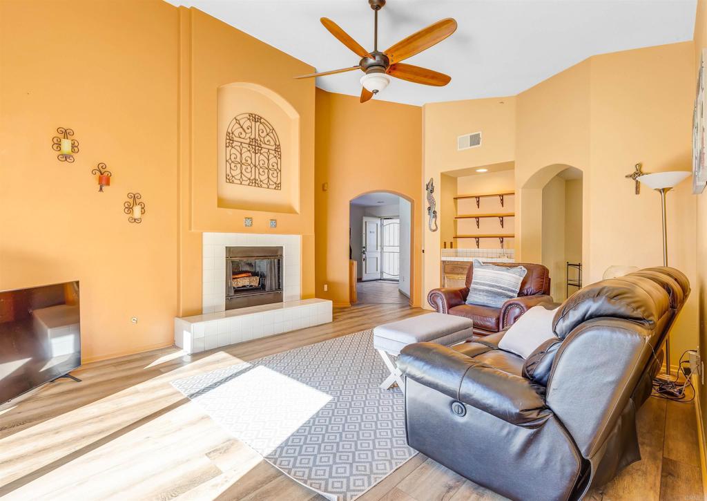 4559 Coronado Drive Oceanside, CA 92057 - Photo 4 of 29 a living room with furniture fireplace and a flat screen tv