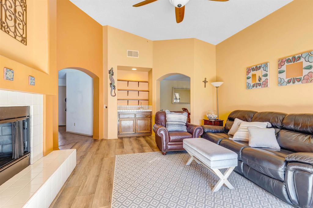 4559 Coronado Drive Oceanside, CA 92057 - Photo 6 of 29 a living room with furniture and a fireplace
