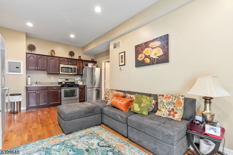 512 Township Line Road Hillsborough, NJ 08844 - Photo 18 of 40 a living room with furniture and kitchen view