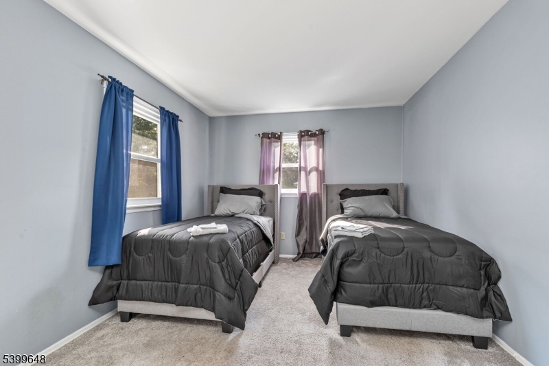 512 Township Line Road Hillsborough, NJ 08844 - Photo 29 of 40 a bedroom with two beds and window