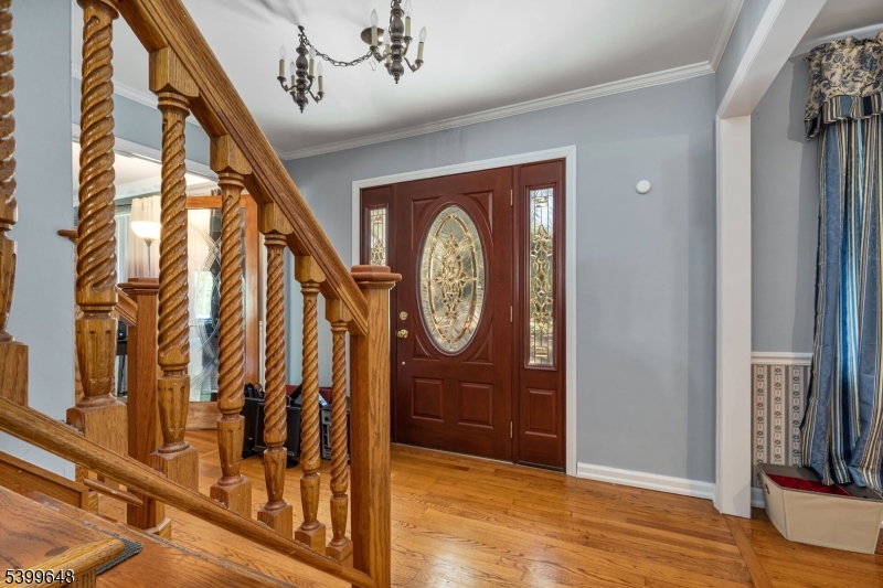 512 Township Line Road Hillsborough, NJ 08844 - Photo 3 of 40 a view of a hallway with wooden floor